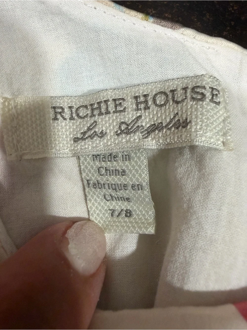 Richie House cream sleeveless